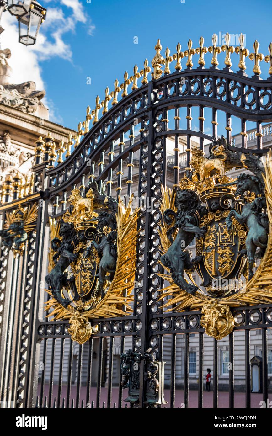 London, UK - August 4, 2017: Gates of Buckingham Palace with black and gold crests. Stock Photo