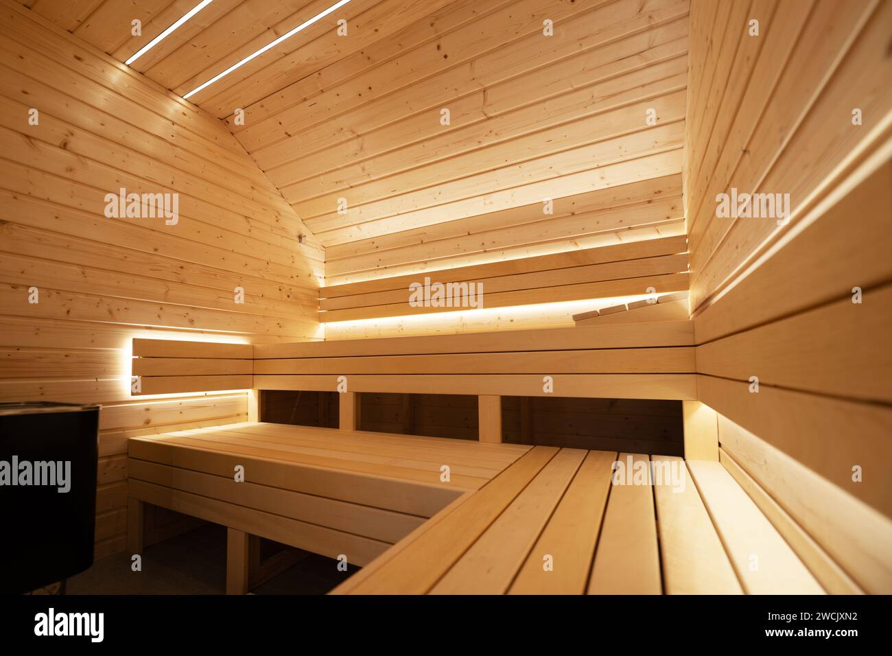 Newly Built Elegant LED Illuminated Indoor Residential Finnish Sauna Stock Photo
