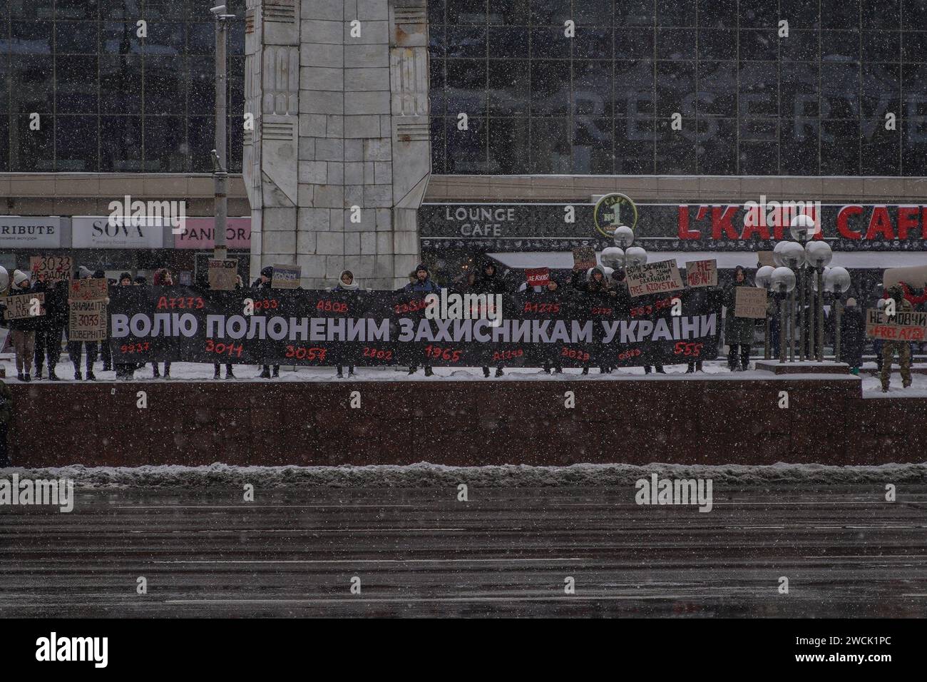Kyiv, Ukraine. 14th Jan, 2024. Yevhen Vasyliev/Le Pictorium - Rally of relatives of Ukrainian defenders of Mariupol and 'Azovstal' who are in Russian captivity - 14/01/2024 - Ukraine/Kiev Oblast/Kyiv - The Ukrainian defenders of Mariupol and 'Azovstal' have been in Russian captivity for 608 days. The relatives of the soldiers held another rally on Halytska Square in Kyiv to support the Ukrainian defenders in Russian captivity and show that they are remembered and are waiting for each of them to return home. Credit: LE PICTORIUM/Alamy Live News Stock Photo