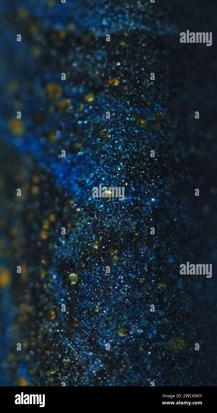 Glitter fluid texture sparkling paint flow blue Stock Photo Alamy