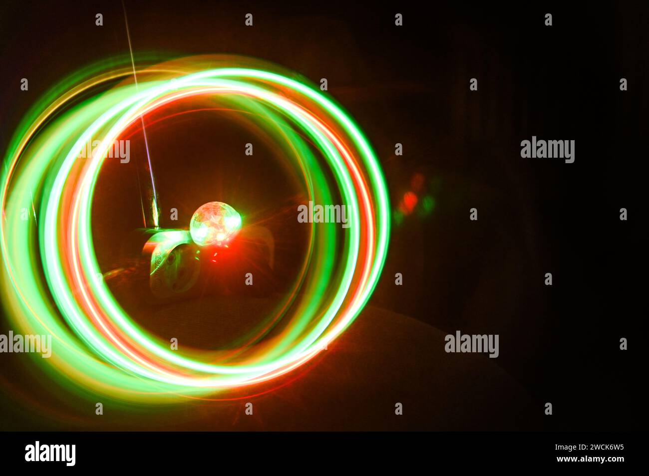 background of green neon circles. abstract background Stock Photo - Alamy