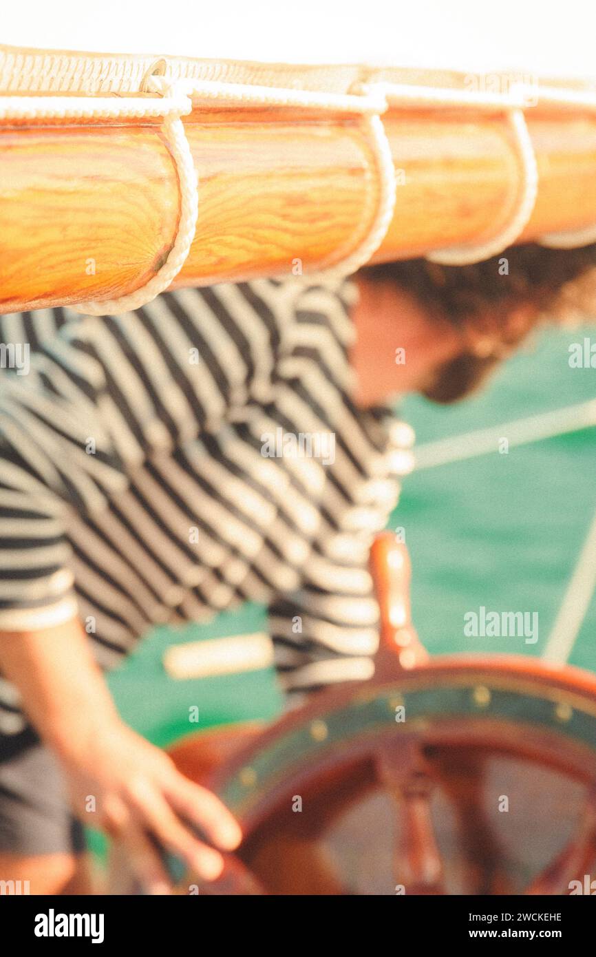 Man gripping steering wheel ready to remove it stock photo alamy