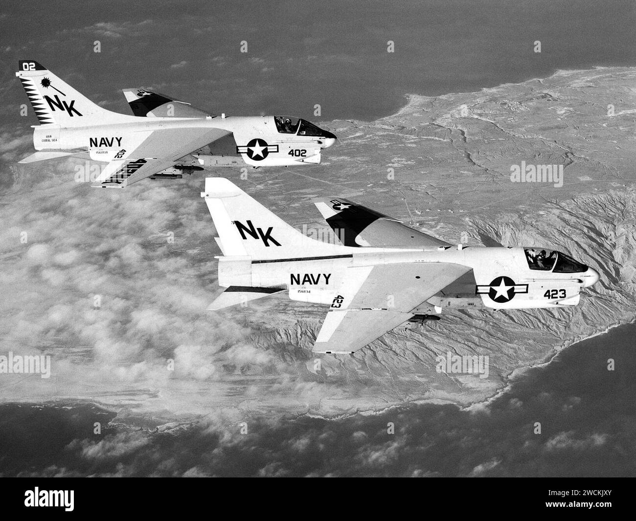 A-7E Corsair IIs of VA-27 in flight over the southern California coast