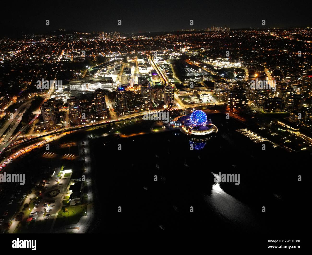 Aerial view of a cityscape illuminated at night Stock Photo - Alamy