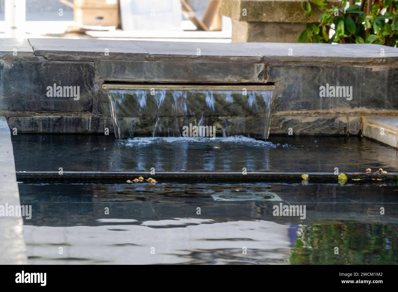 Fountain detail flowing with tranquility Stock Photo