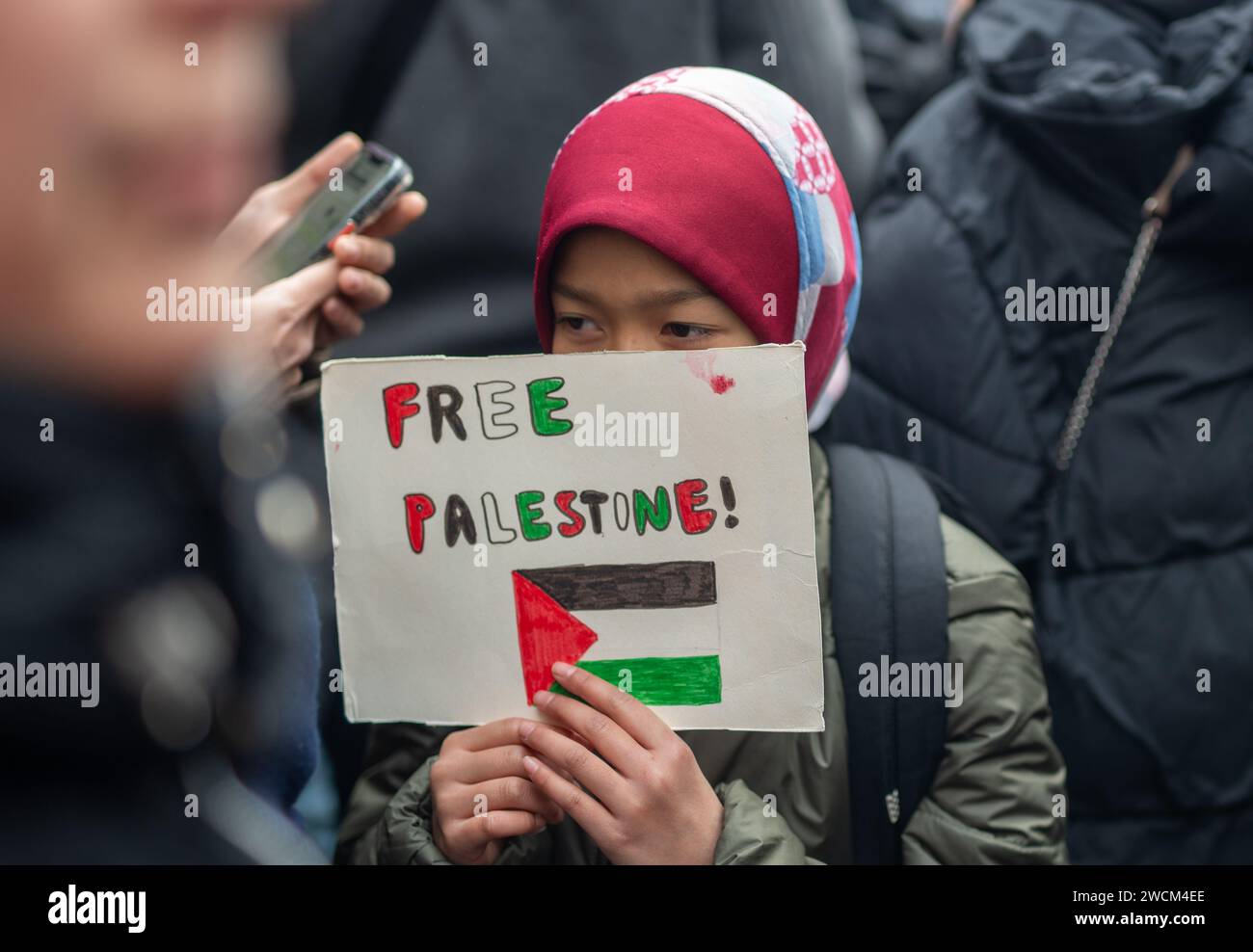 A child holding a Free Palestine sign during a demonstration in support of Palestine in London. Photo date: Saturday, January 13, 2024. Photo: Richard Stock Photo