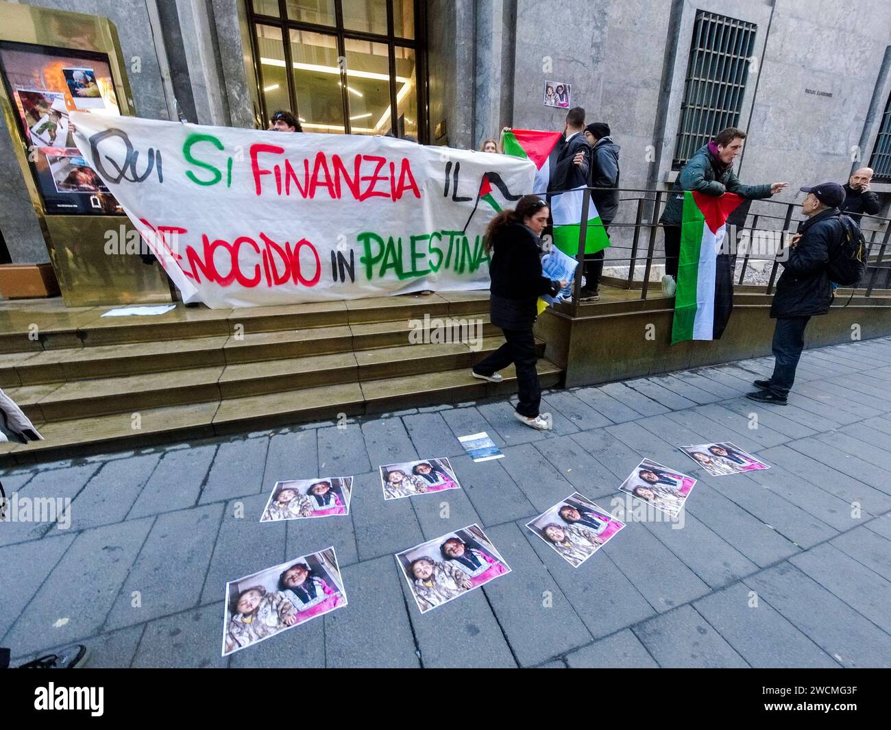 Pro-Palestinian blitz at the Intesa Sanpaolo bank Pro-Palestinian blitz at the Intesa Sanpaolo headquarters in via Toledo. This afternoon, a few dozen activists burst into the intesa san paolo bank building, chanting chants and slogans for the people of Gaza. Here the genocide in Palestine is being financed reads a large banner unfurled in front of the bank, papered by the protesters with leaflets depicting the macabre images of children who died under bombing in the Middle East. DJI 0718 Copyright: xAntonioxBalascox Stock Photo