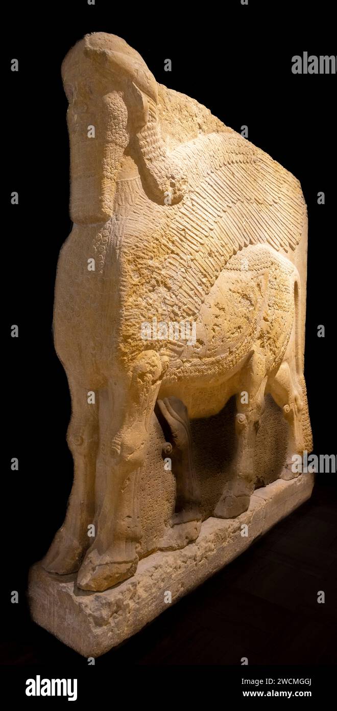 Assyrian lamassu (human-headed winged bull), palace of Dur-Sharrukin,  Khorsabad, Iraq, now in the Iraq Museum, Baghdad, Iraq Stock Photo