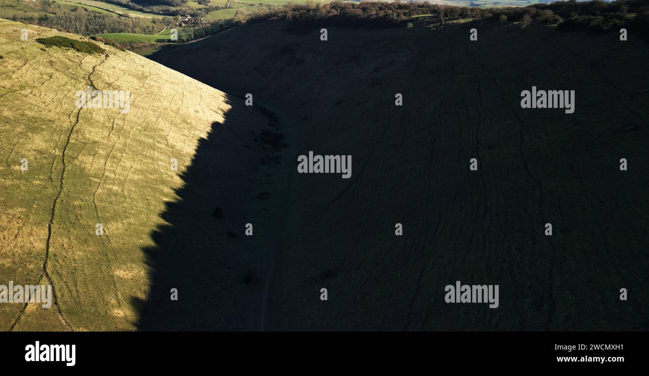 16th January 2024 Winter weather of minus 4 degrees on the South Downs Devils Dyke  Valley. A favourite path for walkers.Credit: Leo Mason Alamy Live News. Aerial image. Stock Photo