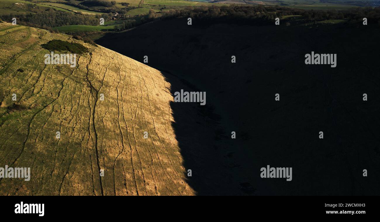 16th January 2024 Winter weather of minus 4 degrees on the South Downs Devils Dyke  Valley. A favourite path for walkers.Credit: Leo Mason Alamy Live News. Aerial image. Stock Photo