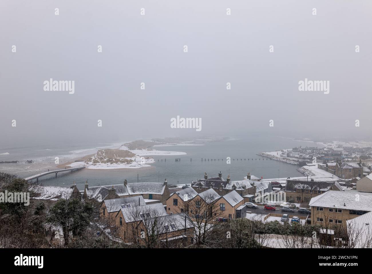 Lossiemouth, Moray, UK. 16th Jan, 2024. This shows the seaside town of Lossiemouth where the river Lossie meets the sea. With the recent few days of artic weather the town and beach are covered in snow. Credit: JASPERIMAGE/Alamy Live News Stock Photo