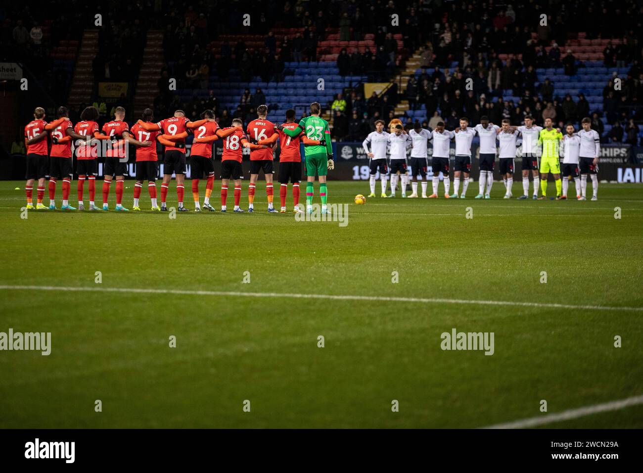 Players pay respects to the Bolton fan that passed away in the crowd during a league game on Saturday during the FA Cup Third Round Replay match between Bolton Wanderers and Luton Town at the Toughsheet Stadium, Bolton on Tuesday 16th January 2024. (Photo: Mike Morese | MI News) Credit: MI News & Sport /Alamy Live News Stock Photo