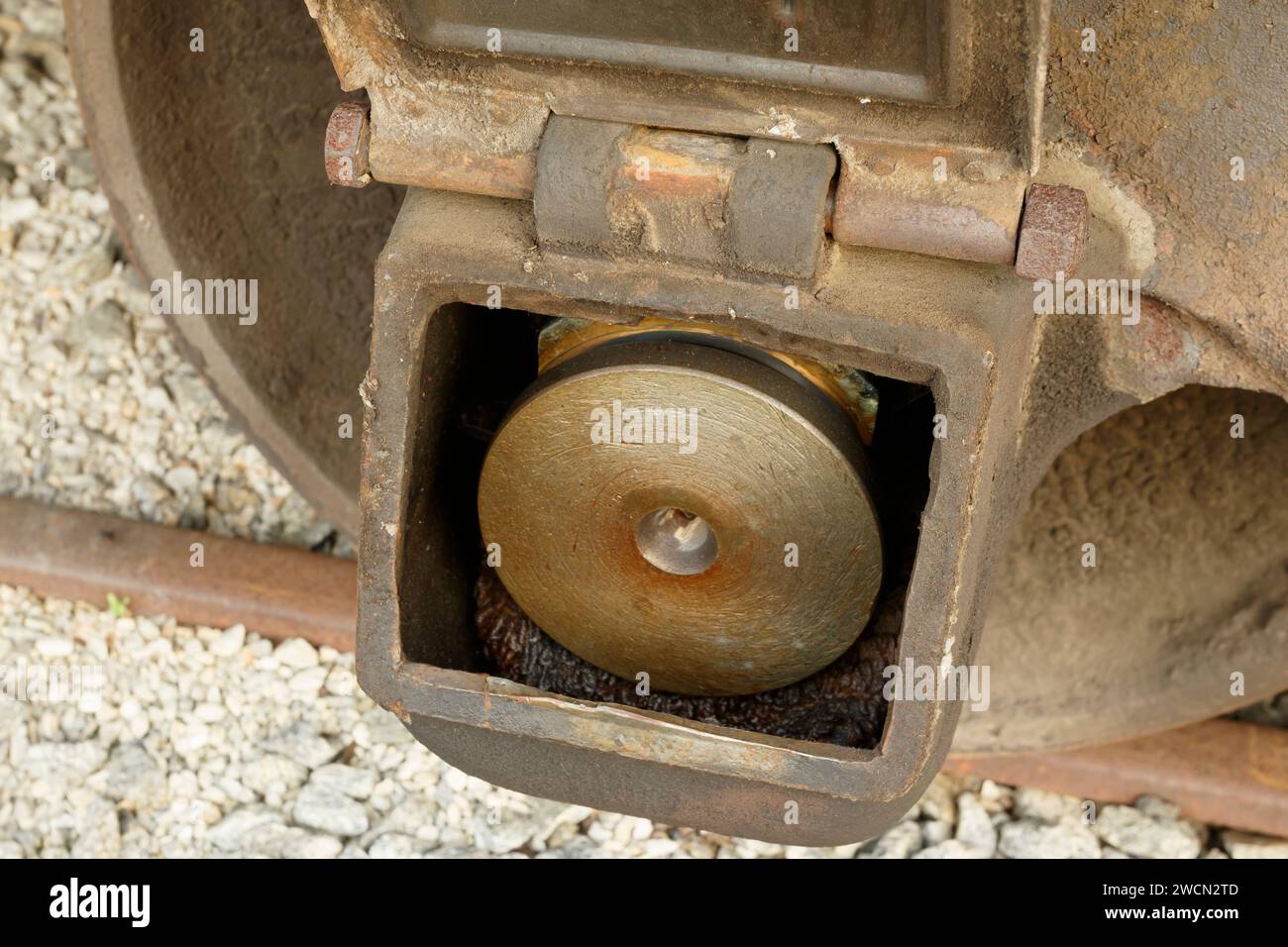 Railroad car axle bearing box with access door open. Lubrication and inspection access. Stock Photo