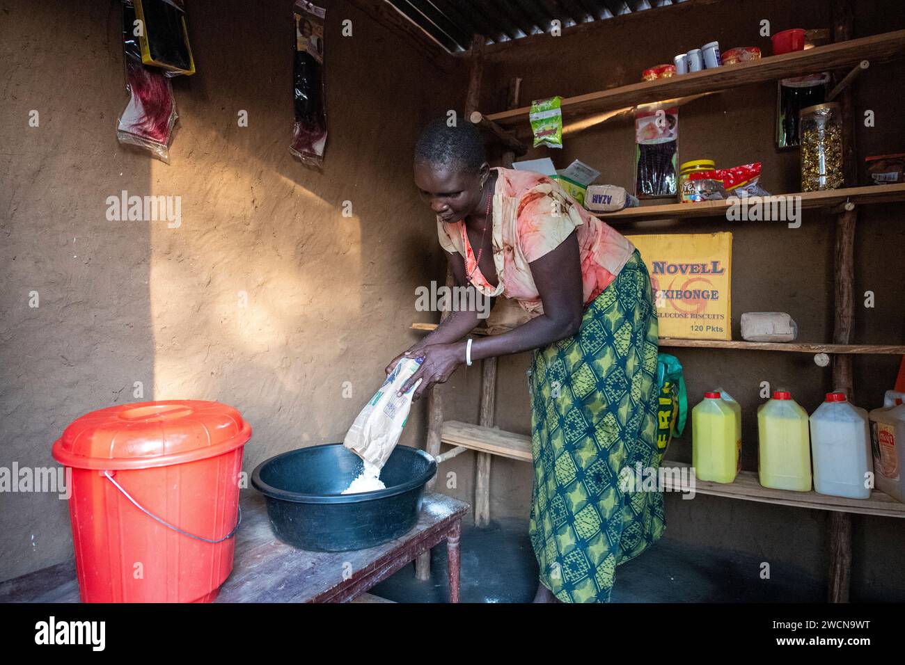Uganda, Adjumani. A South Sudanese refugee is diversifying her business
