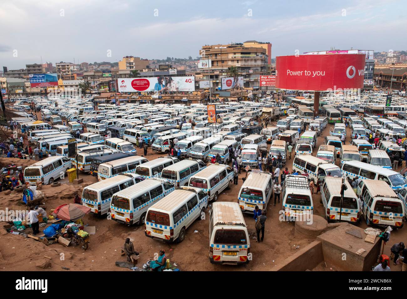 Uganda. A bus depot packed full of transportation busses in Uganda