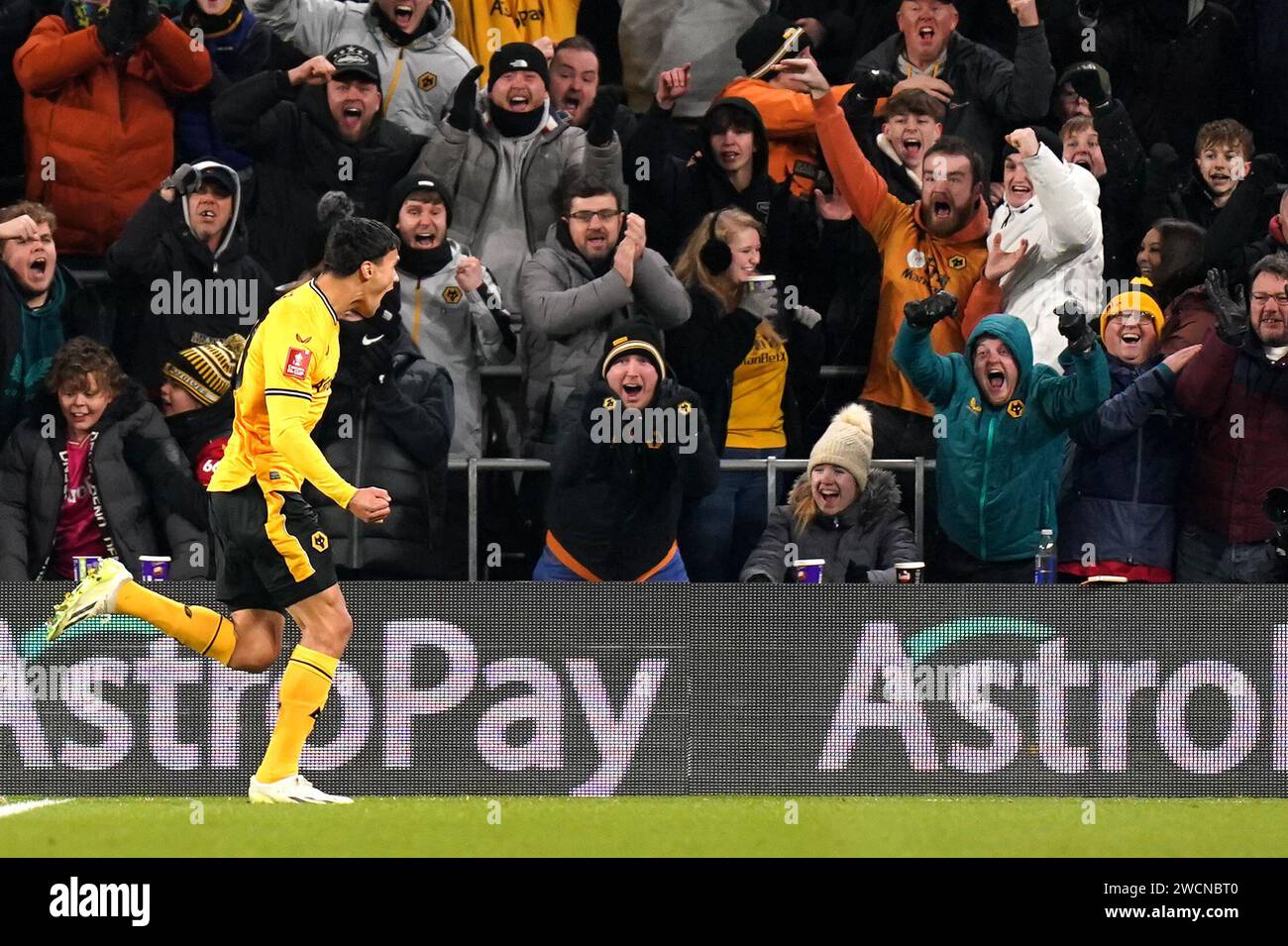 Wolverhampton Wanderers' Nathan Fraser celebrates scoring their side's second goal of the game in front of the home fans during the Emirates FA Cup third round replay match at the Molineux Stadium, Wolverhampton. Picture date: Tuesday January 16, 2024. Stock Photo