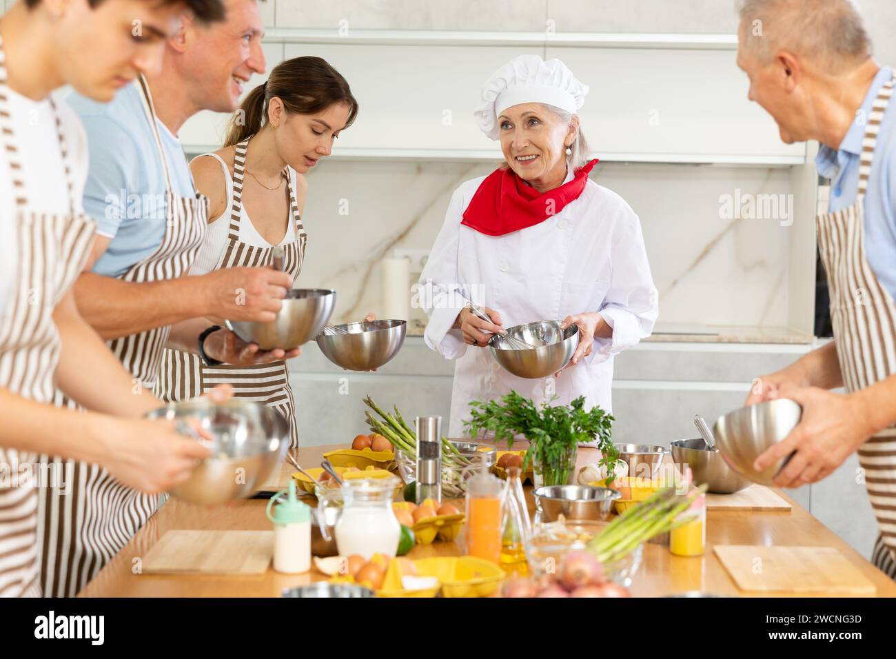 Cooking With Adult French cooking lesson hi-res stock photography and images - Alamy