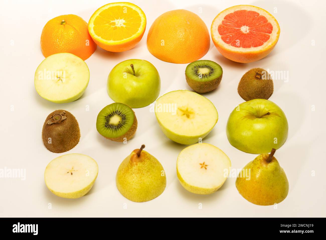Fresh fruit cut in half. citrus fruits, lime, lemon, orange, grapefruit