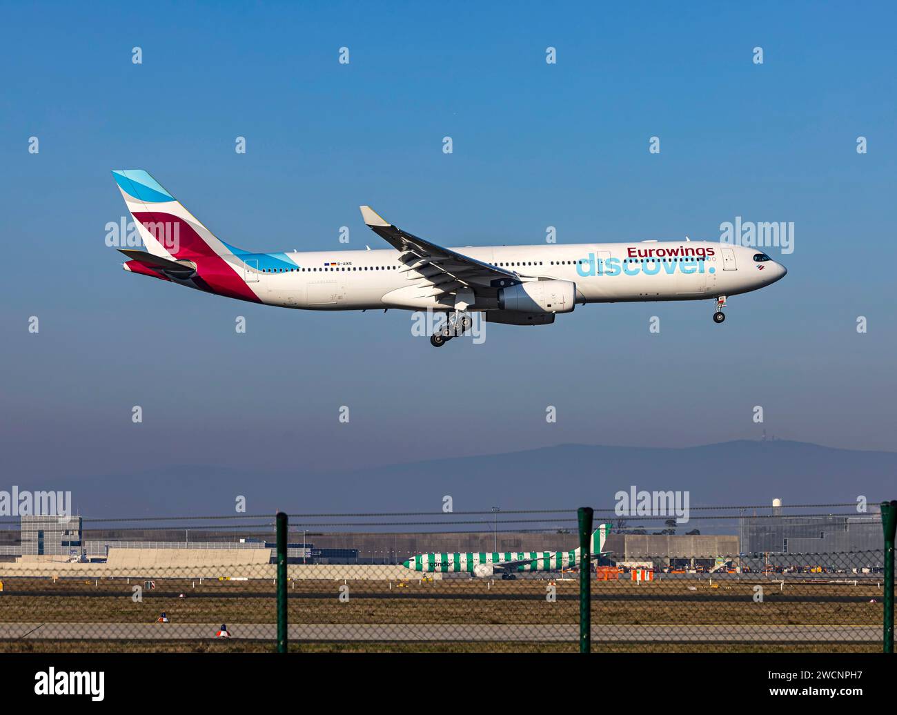 Aircraft approaching Frankfurt Airport, Fraport Airport. Aircraft registration D-AIKE, DISCOVER AIRLINES, AIRBUS A330-300, Frankfurt am Main, Hesse Stock Photo