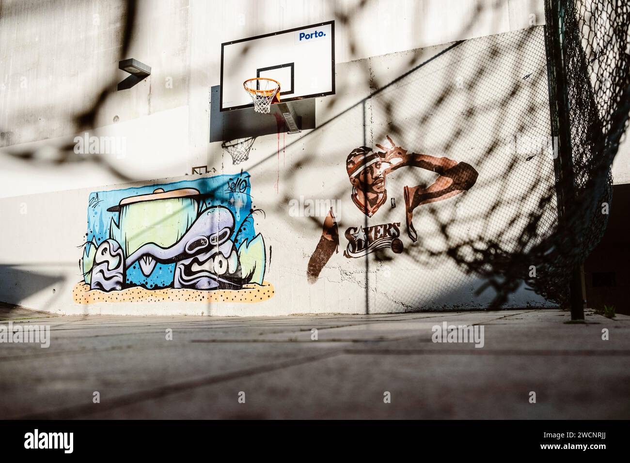 April 17, 2023, Porto, Portugal: Nice street art, murals on playing field Stock Photo