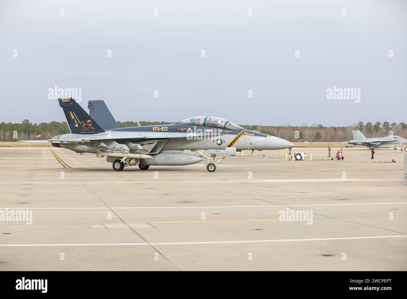 240115-N-YM590-1087 VIRGINIA BEACH, Va. (Jan. 15, 2024)- An F/A-18F Super Hornet, assigned to the “Fighting Blacklions” of Strike Fighter Squadron (VFA) 213, taxis on the flightline after returning to Naval Air Station Oceana in Virginia, Jan. 15, following a more than eight-month deployment with the Gerald R. Ford Carrier Strike Group. While deployed, the squadron accomplished 1,943 sorties covering 3,137 flight hours with a 97% sortie completion rate. (U.S. Navy photo by Chief Mass Communication Specialist Brian M. Brooks) Stock Photo