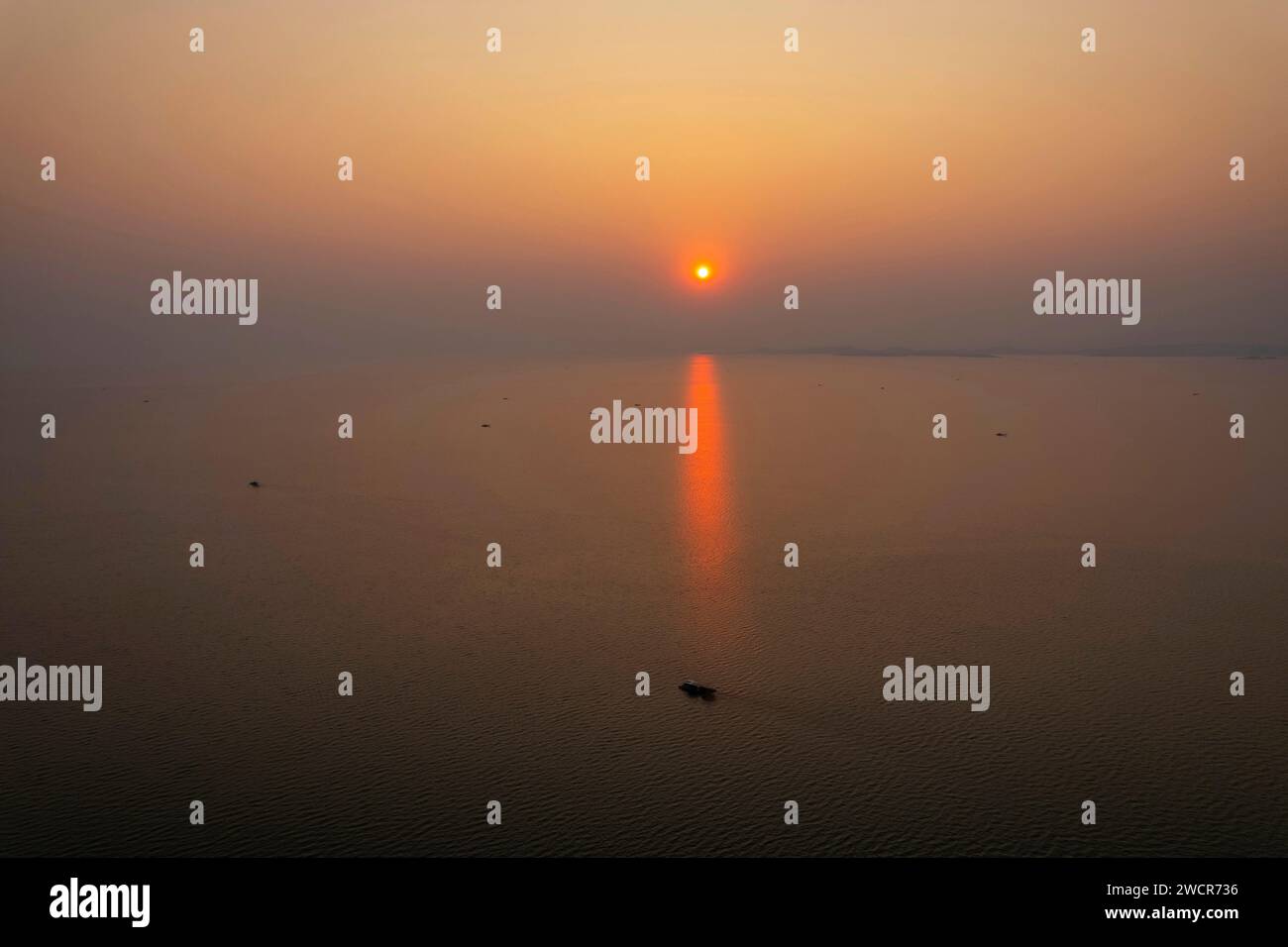 The sun setting over Lake Kariba in Zimbabwe. Stock Photo