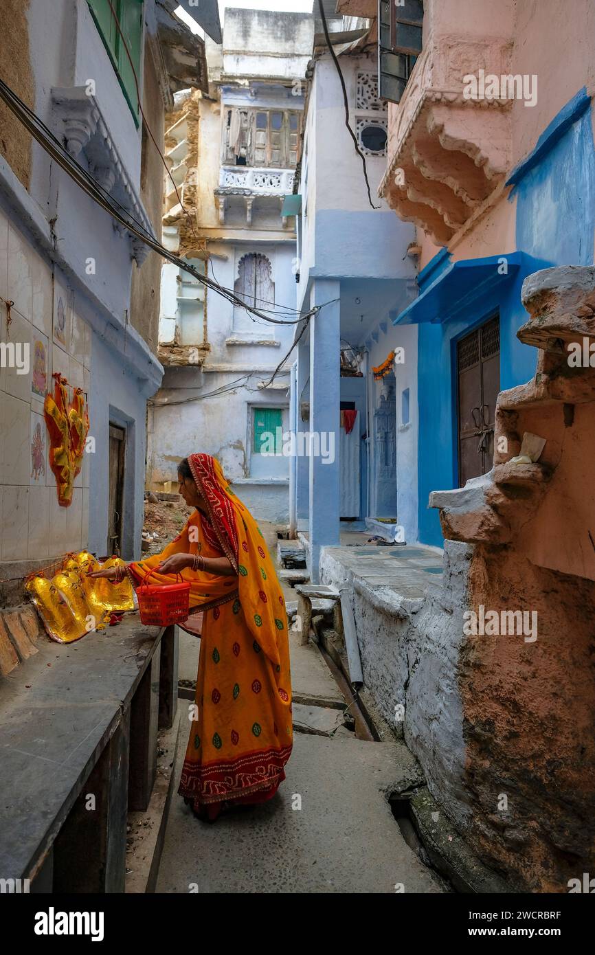 Offering clothes hi-res stock photography and images - Alamy