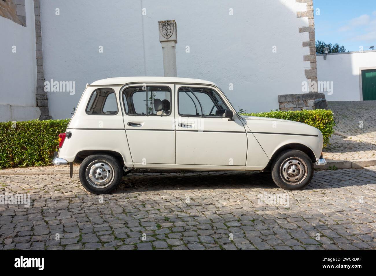 Old White Renault 4 GTL Car Parked In Tavira Portugal January 1, 2024 Stock Photo