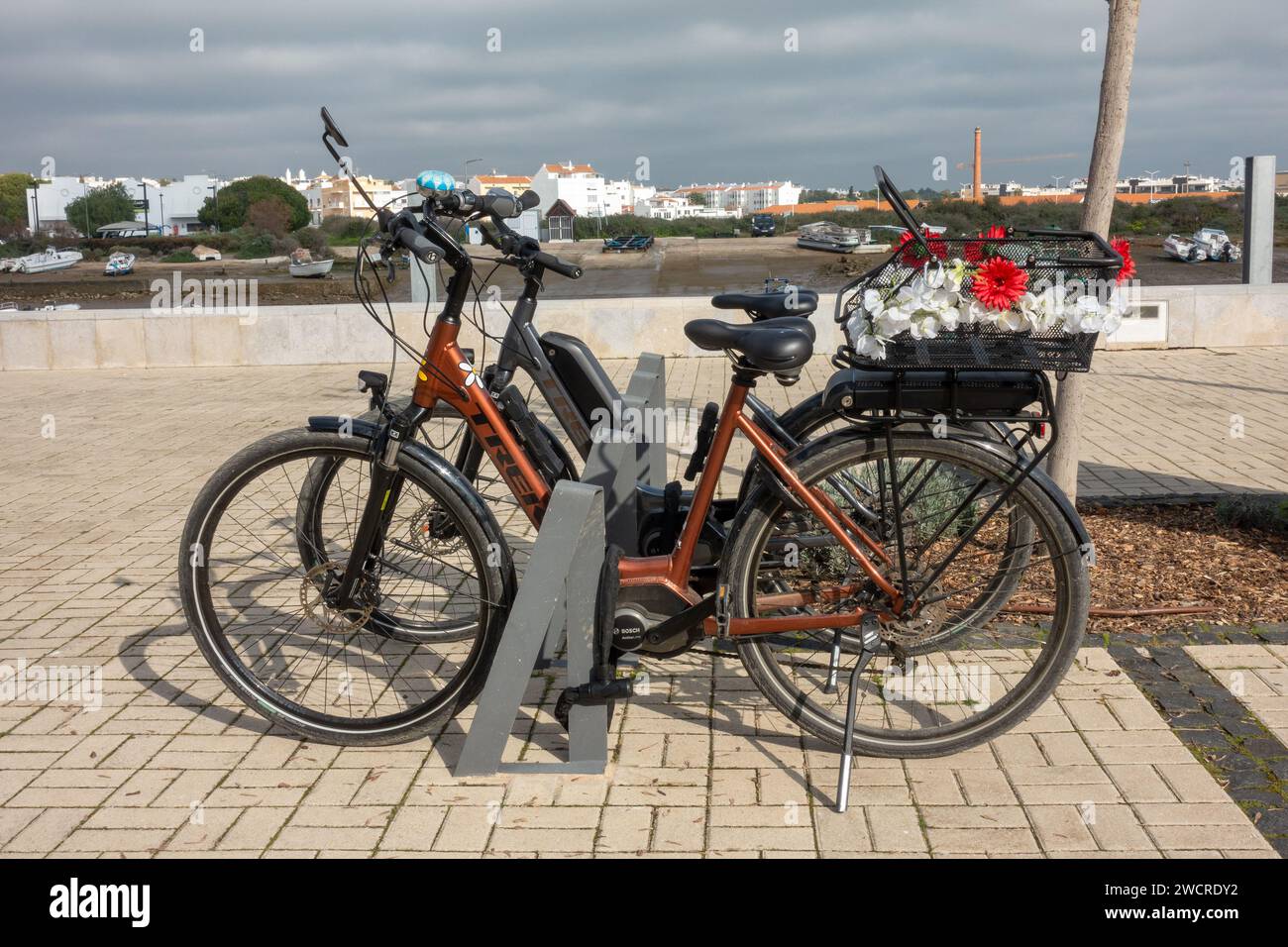 Two Electric Bicycles Parked In Tavira Portugal January 2, 2024 Stock Photo