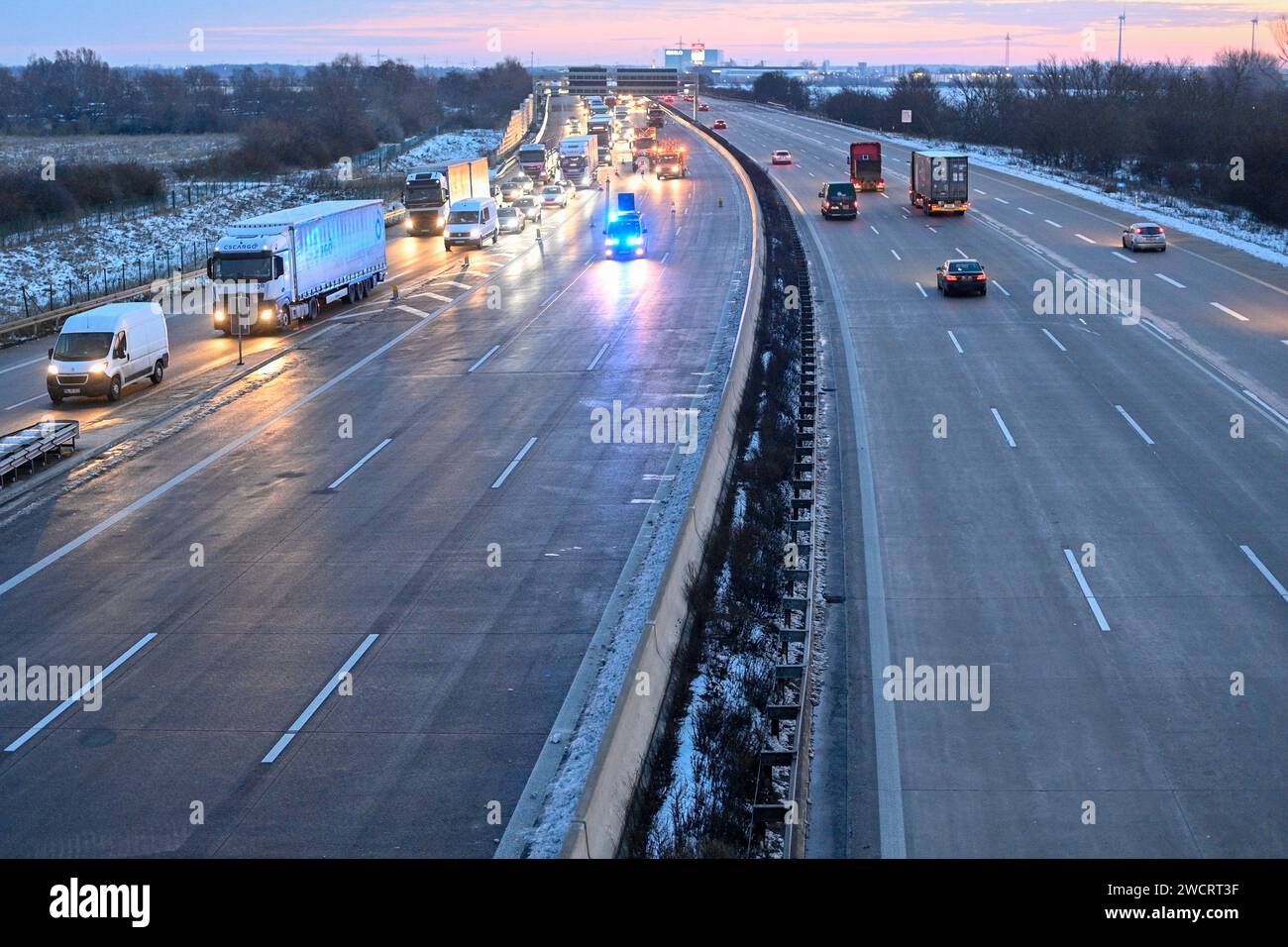 17 January 2024, Saxony-Anhalt, Magdeburg: Traffic on the A2 freeway is being diverted past the scene of an accident via the Magdeburg Zentrum exit and slip road. A 78-year-old wrong-way driver was killed in an accident there on Wednesday morning. Another person was seriously injured, according to the police. The man had driven onto the highway in the wrong direction. On the carriageway towards Hanover, his car then collided head-on with a van and hit another vehicle. The wrong-way driver died at the scene of the accident. One person in the van suffered serious injuries. Photo: Klaus-Dietmar G Stock Photo