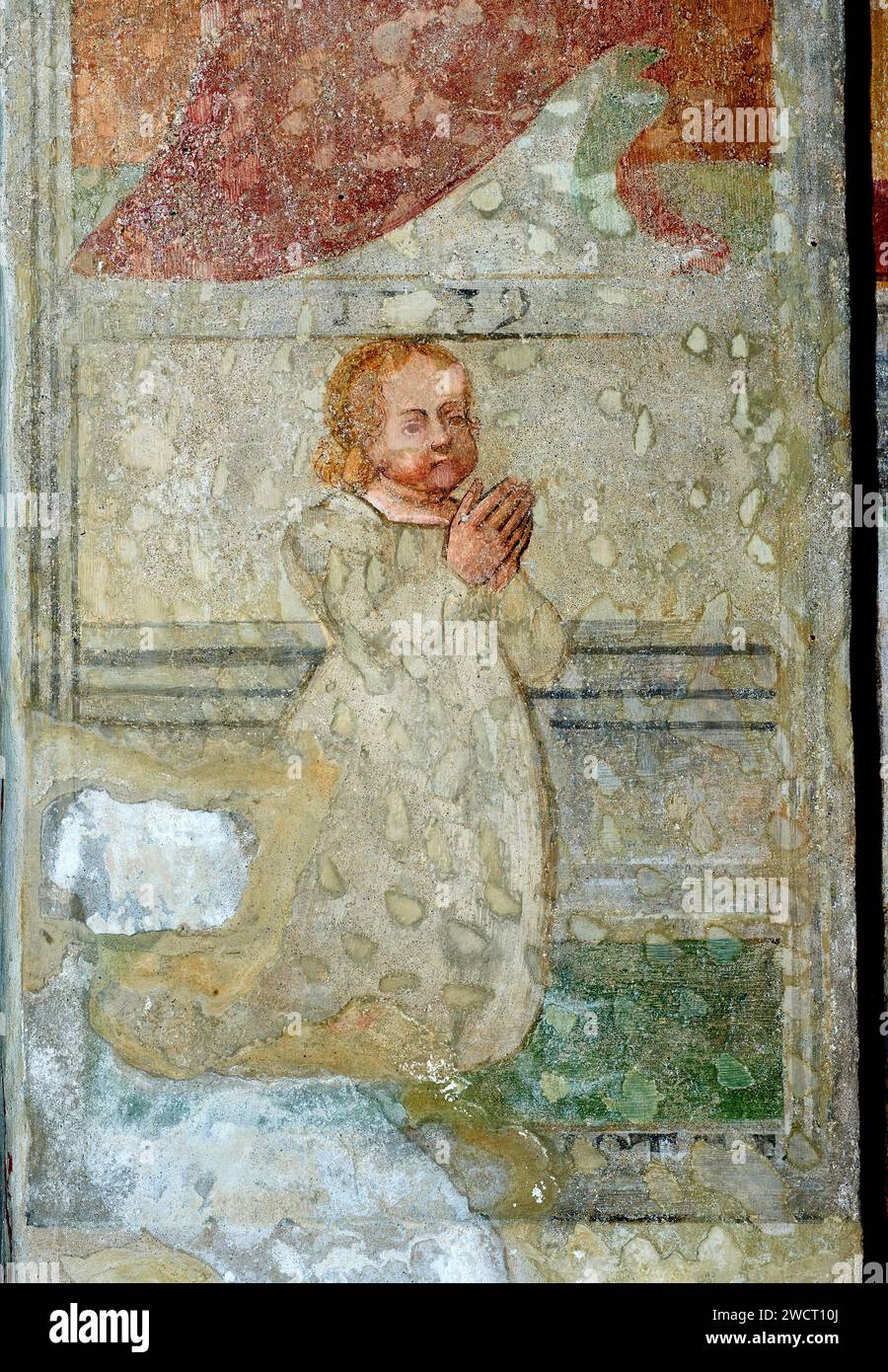 una bambina in preghiera  - affresco - pittore lombardo del prima metà del XV secolo - Barco di Orzinuovi (Bs) chiesa della Madonna della Rosa Stock Photo