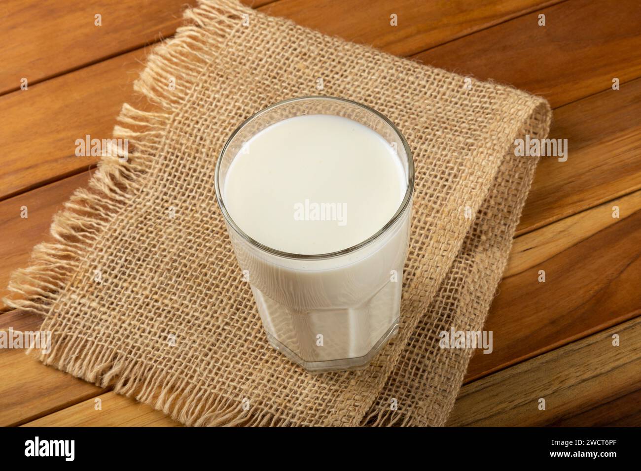 Glass of fresh milk on the table. Stock Photo