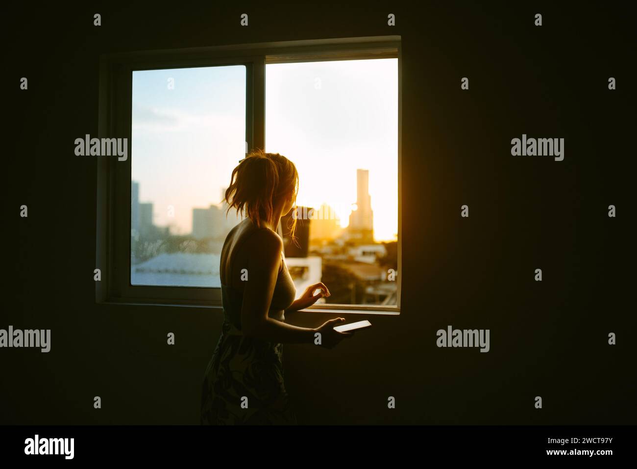 Looking out of high rise window hi-res stock photography and images - Alamy
