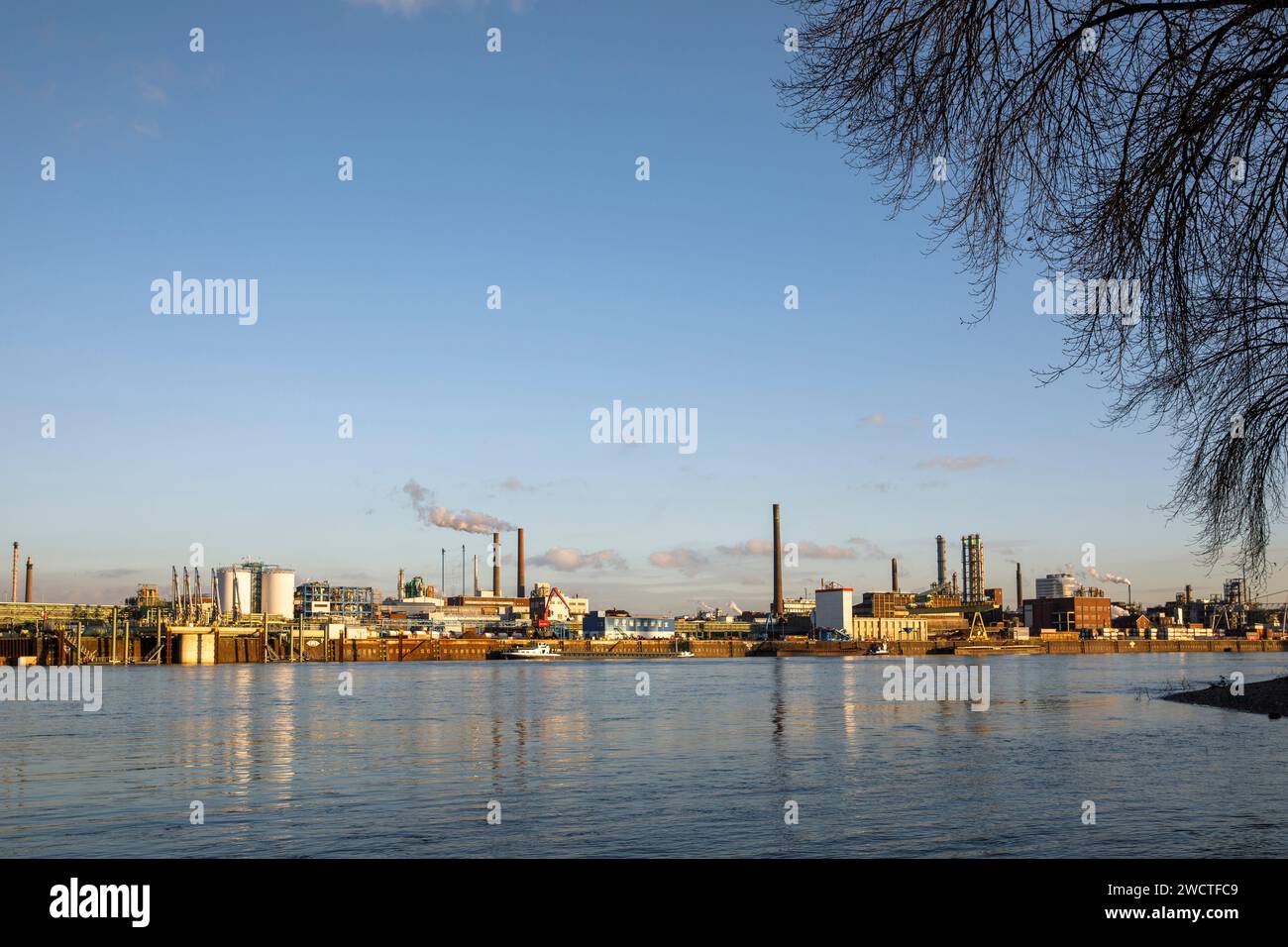 view over the Rhine to the Chempark, former known as the Bayerwerk, Leverkusen, North Rhine-Westphalia, Germany.  Blick ueber den Rhein zum Chempark, Stock Photo