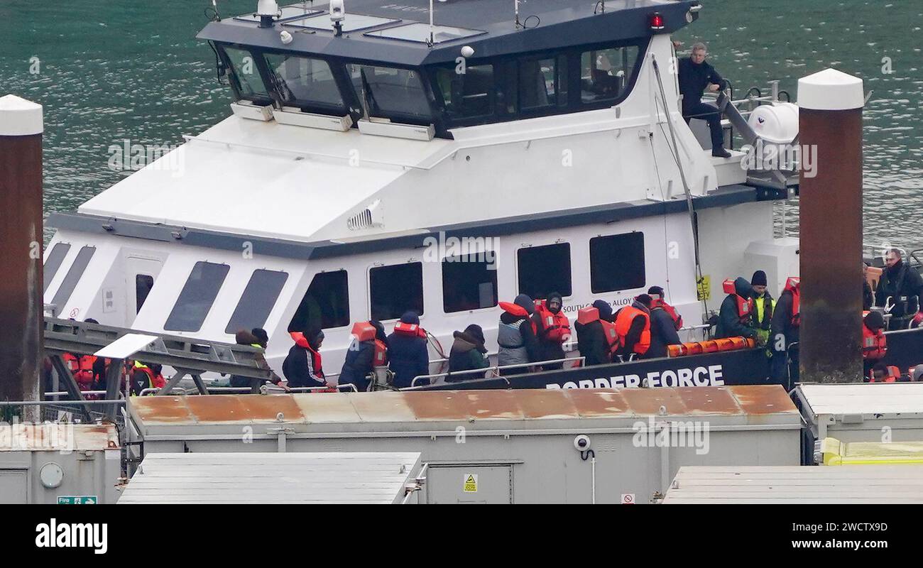 A group of people thought to be migrants are brought in to Dover, Kent, from a Border Force vessel following a small boat incident in the Channel. Picture date: Wednesday January 17, 2024. Stock Photo