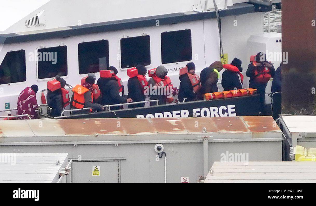 A group of people thought to be migrants are brought in to Dover, Kent, from a Border Force vessel following a small boat incident in the Channel. Picture date: Wednesday January 17, 2024. Stock Photo