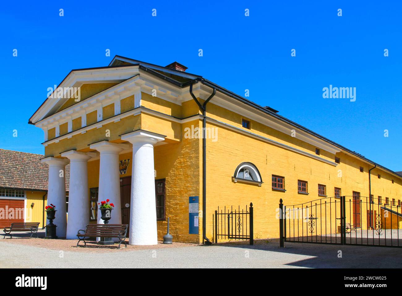 Wiurila Manor homestead designed by C. L. Engel, built 1835–1845, with Doric portico on a sunny day of summer. Halikko, Salo, Finland. June 25, 2022 Stock Photo