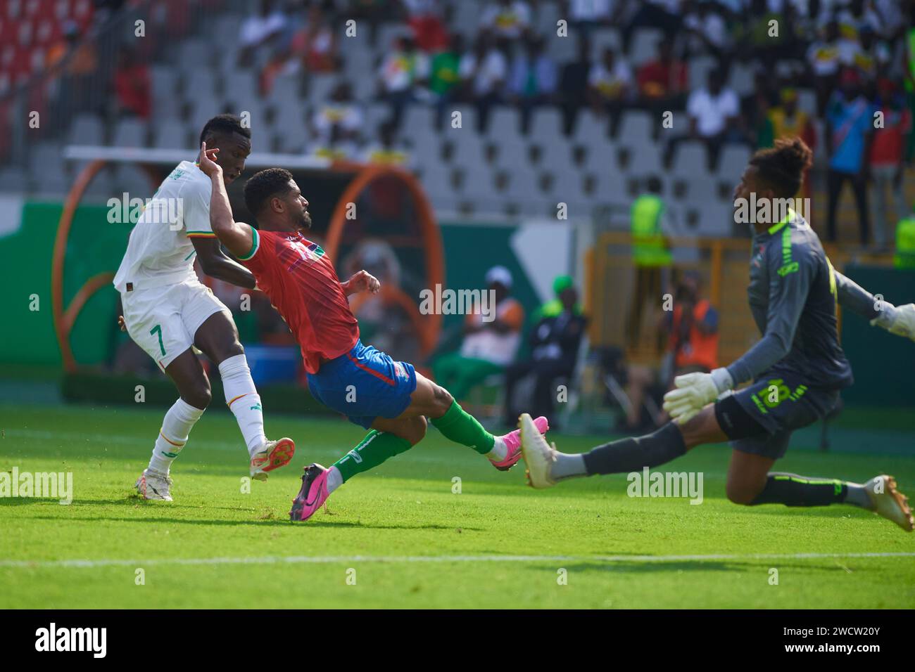 Gambian goalkeeper Baboucarr Gaye tries with his teammate to block ...