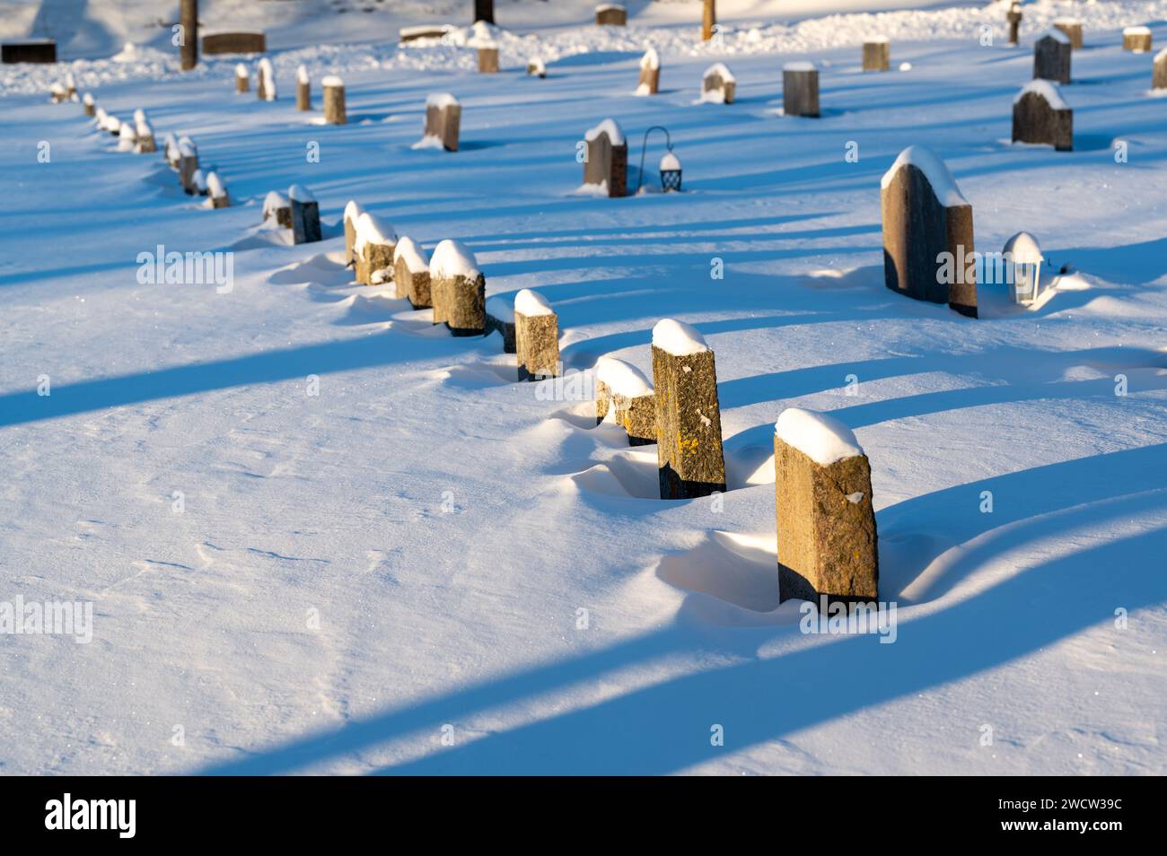Graveyard covered in snow in Kumla Sweden Stock Photo