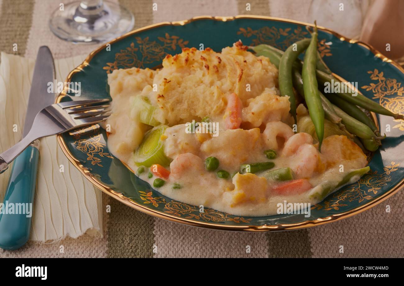 Traditional fish pie with runner beans Stock Photo Alamy