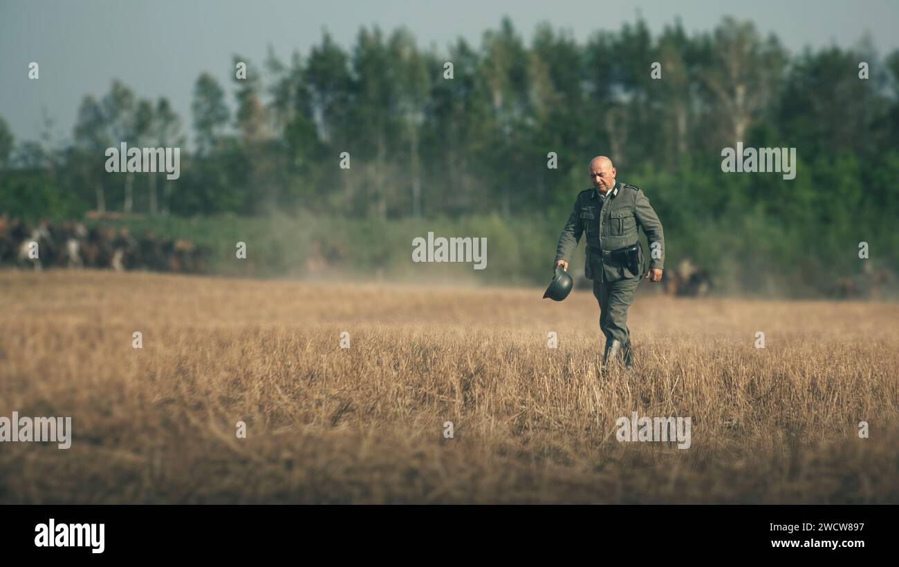 Nazi soldier walking in battlefield Stock Photo