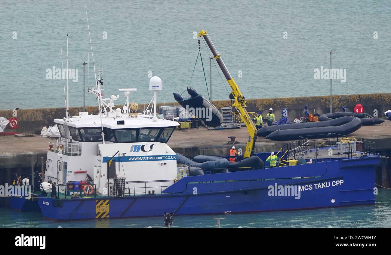 Boats used by people thought to be migrants are brought in to Dover