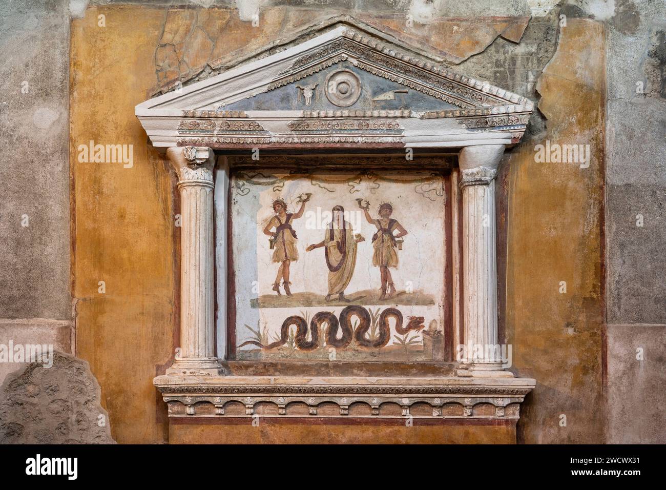 Italy, Campania, the Bay of Naples, Pompei, house of the Vettii, household lararium on west Stock Photo