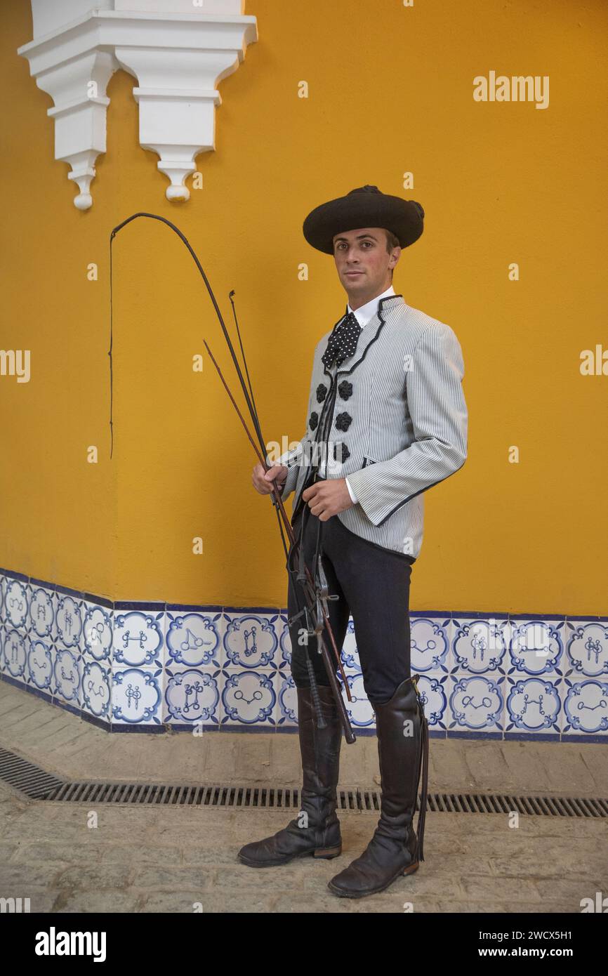 Spain, Andalusia, Jerez de la Frontera, Andalusian royal school of equestrian art, rider in Goyesque costume in the vaulted stables Stock Photo
