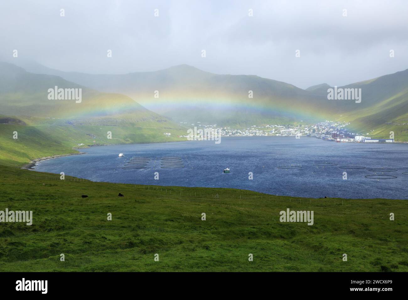Denmark, Faroe Islands, Eysturoy island, Fuglafjordur, rainbow Stock Photo