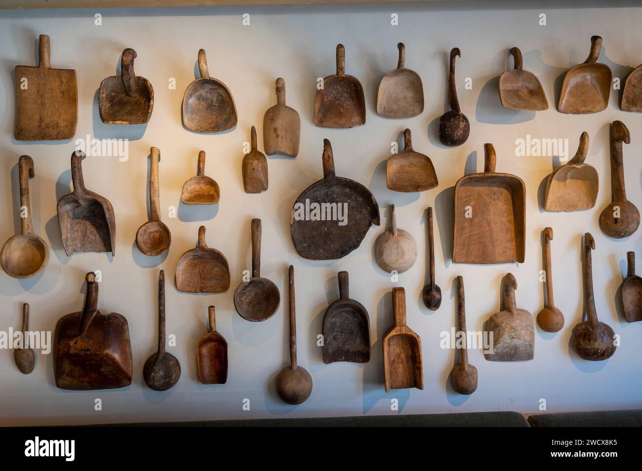 France, Haute Savoie, Megeve, 5-star hotel l'Alpaga, in the room of the restaurant Bistro de l'Alpaga, a collection of wooden curd shovels Stock Photo