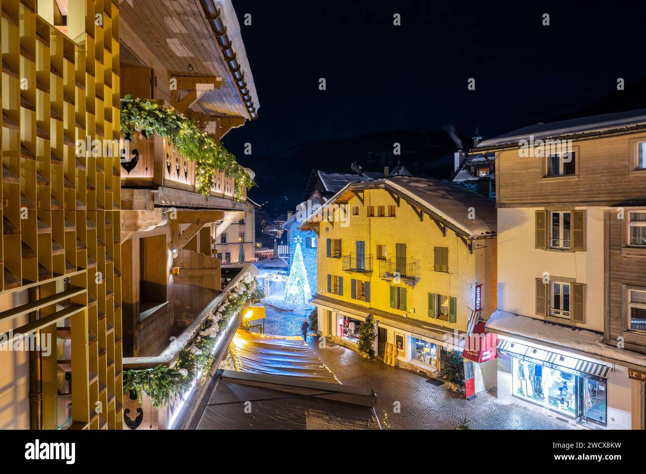 France, Haute Savoie, Megeve, 4-star Coeur de Megève hotel restaurant, night view of the street from a room Stock Photo