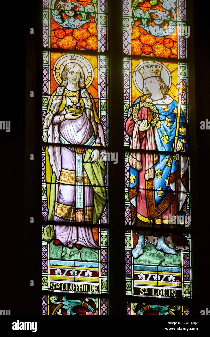 France, Meurthe et Moselle, Nancy, Saint Joseph church achieved in 1905 built in neo Romanesque style by architect Leopold Amedee Hardy, stained glass window made by master glassmaker from Nancy Georges Janin which represents on the left Sainte Clothilde, queen of France, second wife of king Clovis who thanks to her converted to christianism, on the right Saint Louis, king of France, honored here as husband and father of the 11 children he had with Marguerite de Provence, located Rue Mon Desert Stock Photo