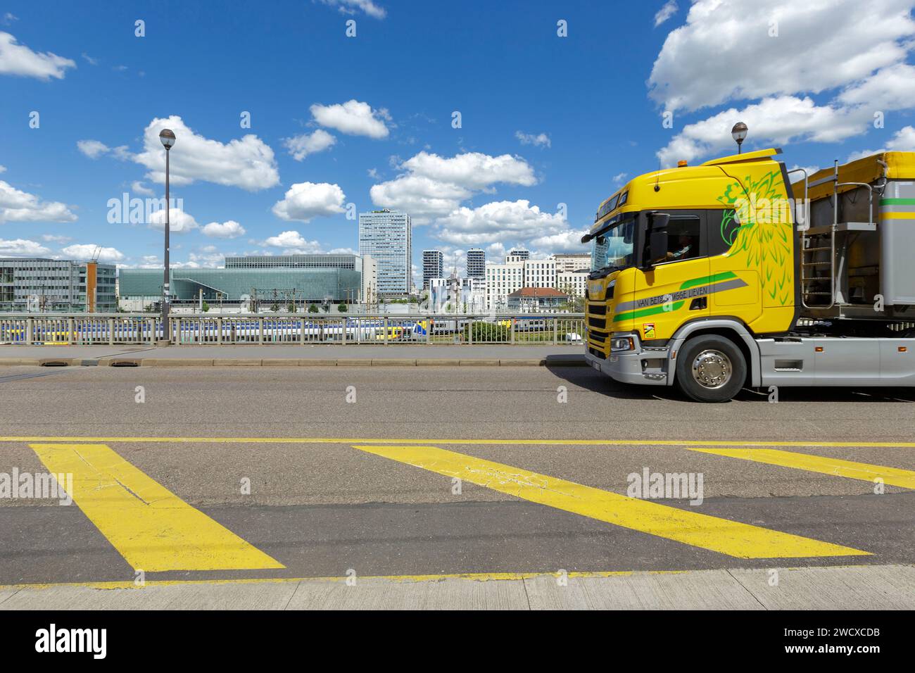 France, Meurthe et Moselle, Nancy, truck on Viaduc Kennedy, the fire station with its street art facade by american street artist MOMO, Saint Sebastien towers apartment buildings and Nancy Ville train station in the background in Nancy Ville train station area Stock Photo