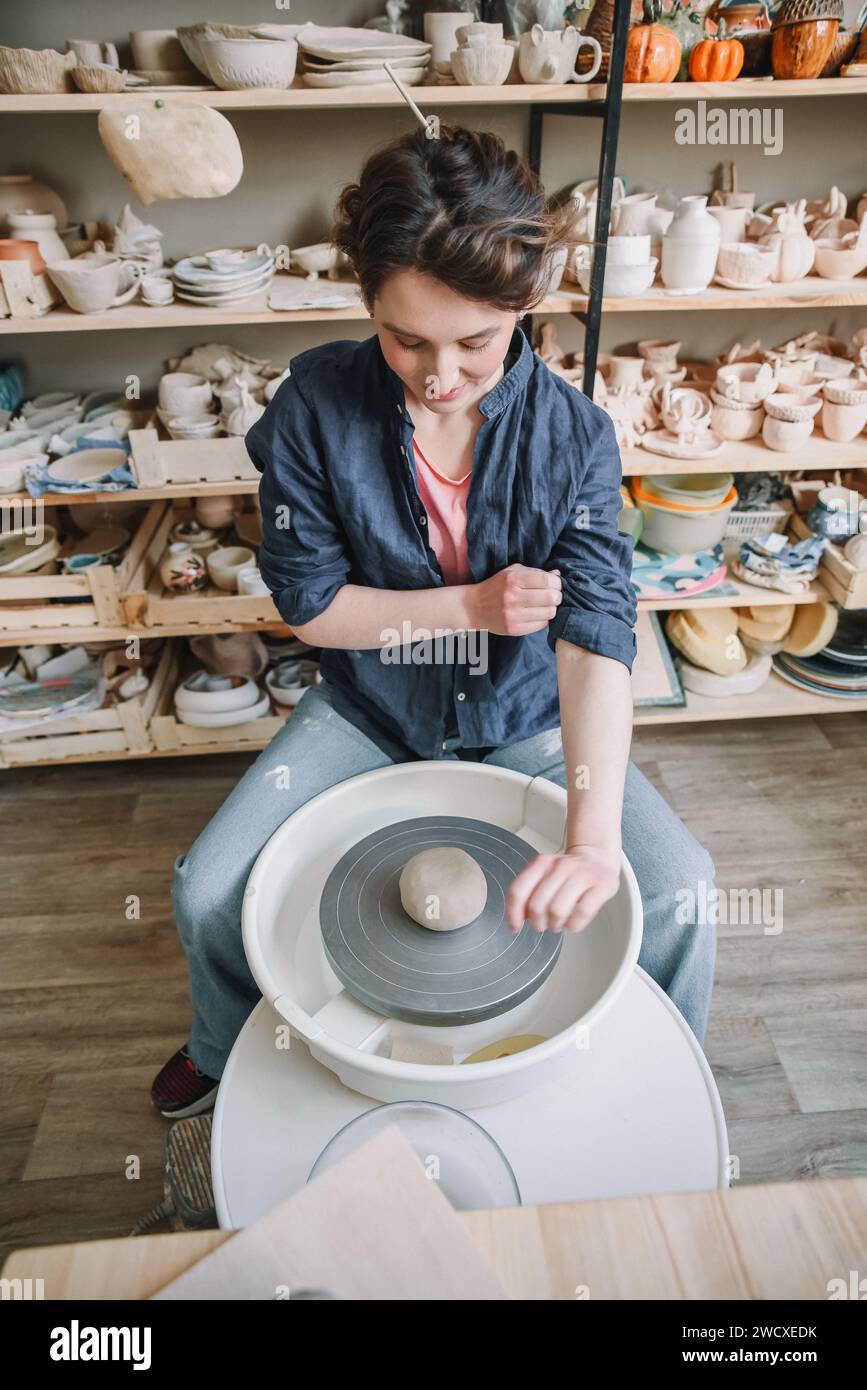 Preparing for work as potter in workshop, beginning new day Stock Photo